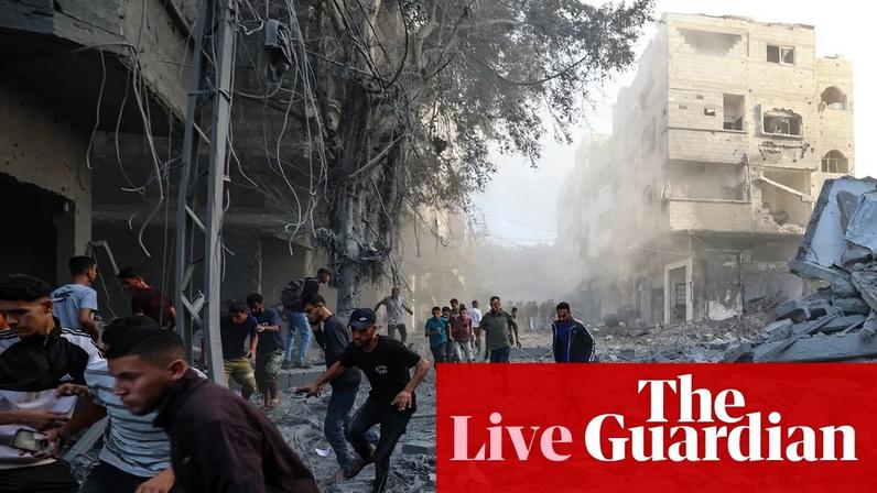 People run for cover following an Israeli strike that targeted a building in the Bureij camp in central Gaza on Sunday.