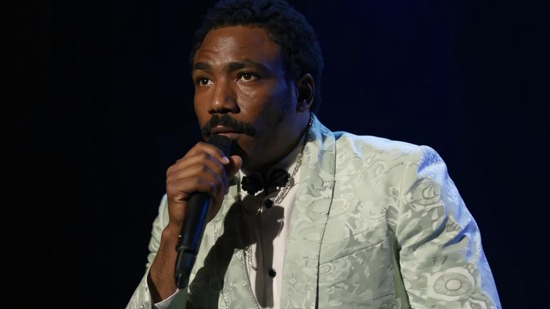 Donald Glover got candid about why he was forced to cancel his Childish Gambino New World Tour dates last year while performing at Camp Flog Gnaw on Saturday. Amazon Music