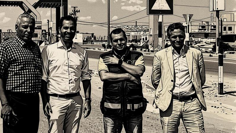 Mohammed Baraka, second from right, on his last day at the border between Gaza and Egypt.