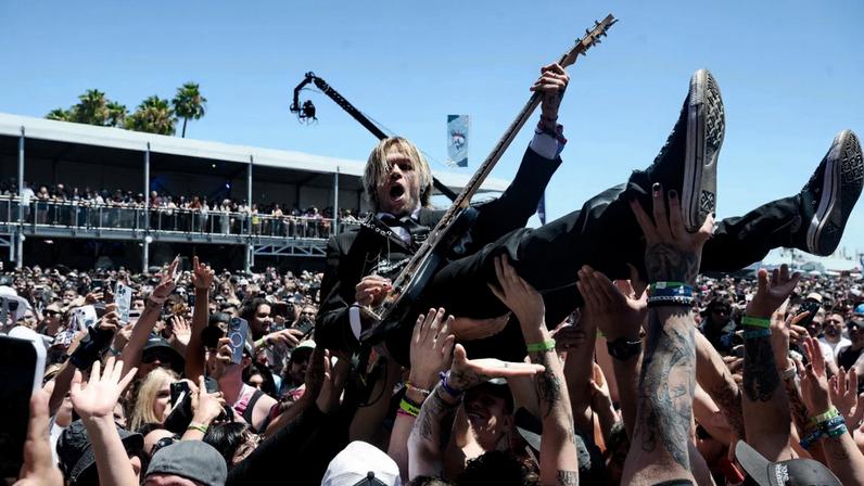 Jordy Sommer crowd surfs at Warped Tour 2025 in Long Beach, California