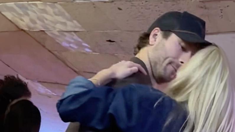 Glen Powell was spotted getting cozy with Michelle Randolph while line dancing in Texas.