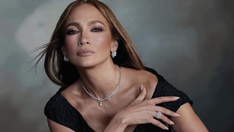Jennifer Lopez modeling a diamond necklace, earrings, and engagement ring from Turkish brand Zen Dimaond. @zendiamondusa/Instagram
