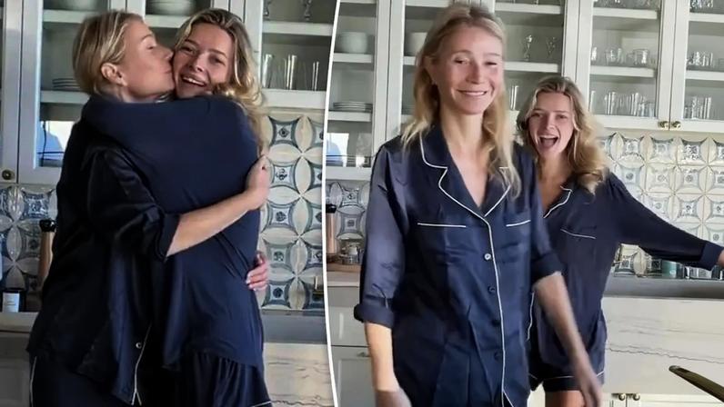 Gwyneth Paltrow and her daughter Apple hugging in their kitchen.
