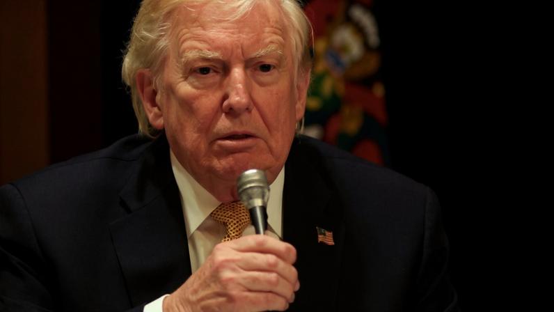 U.S. President Donald Trump takes part in a Christmas Eve dinner in the ballroom of his Mar-a-Lago club in Palm Beach, Florida, U.S., December 24, 2025. REUTERS/Jessica Koscielniak