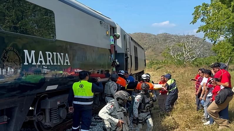 Mexican army soldiers and civil protection members rescue passengers from the Interoceanic train that derailed in Nizanda, Oaxaca state, on the route to Coatzacoalcos, Mexico, on 28 December 2025.