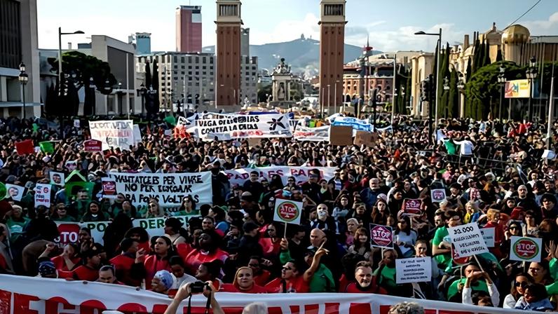 Thousands gathered in central Barcelona in April to demand lower housing costs and an end to evictions.