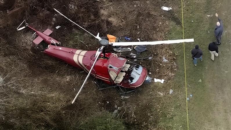 Authorities look over the scene after two helicopters crashed in Hammonton, New Jersey, on 28 December 2025.