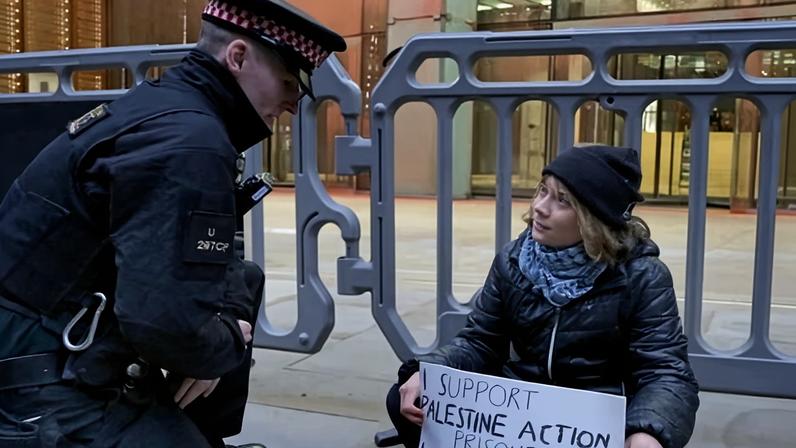 Police said Greta Thunberg was detained for displaying a placard in support of a proscribed organisation.