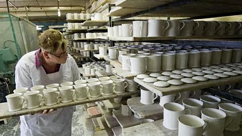 A worker at a pottery in Stoke-on-Trent, Staffordshire.