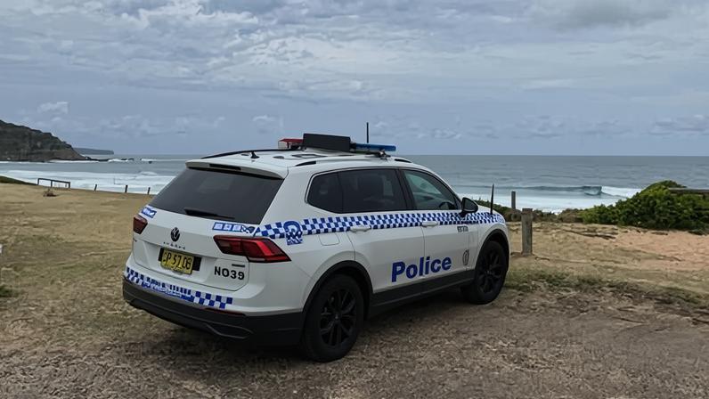 Police joined a search at north Palm Beach in Sydney for a boy feared missing after a boat capsized leaving one man dead.