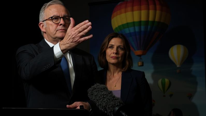 Anthony Albanese and Anika Wells speak to the media. The PM says public servants’ spending on travel should not be extravagant.