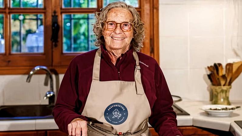 Maria Antònia Udina, 76, prepares a Penedès cockerel with dried fruit and nuts and a dash of cognac, a dish characteristic of Catalan cuisine.