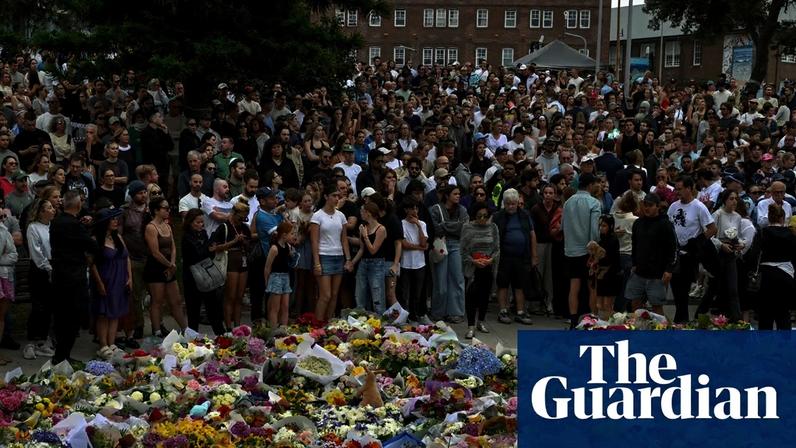 Anthony Albanese’s handful of flowers was soon joined by a sea of bouquets, some handed out free by local stores, and a growing crowd, silently sitting or standing on the hill.