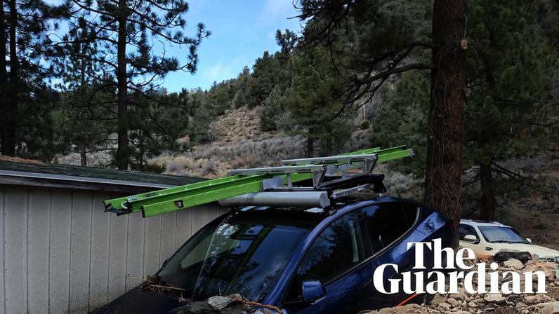 Footage shows homes buried in mud after California floods – video