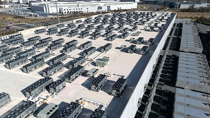 Cooling vent fans on a roof next to generators on the lower level of a Digital Realty data center in Ashburn, Virginia, on 12 November. Photograph: Andrew Caballero-Reynolds/AFP/Getty Images