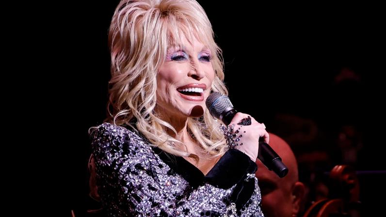 Dolly Parton speaking at the Schermerhorn Symphony Center in Nashville, Tennessee in March 2025.