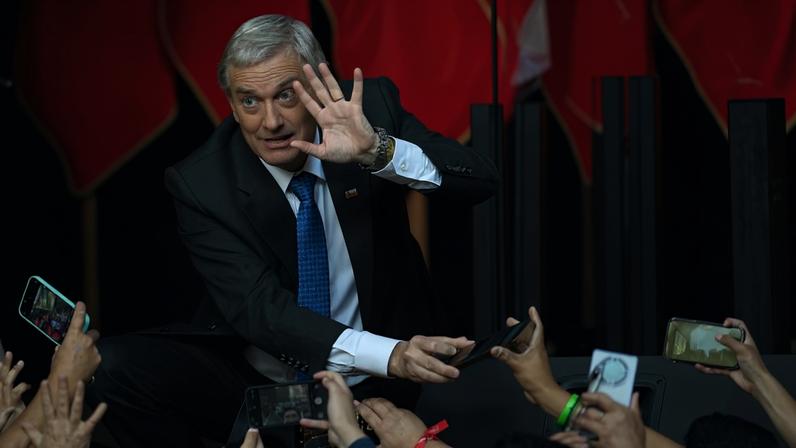 Chile's presidential candidate Jose Antonio Kast of the Republican Party waves to supporters during his closing campaign rally in Temuco, Chile on December 11, 2025.
