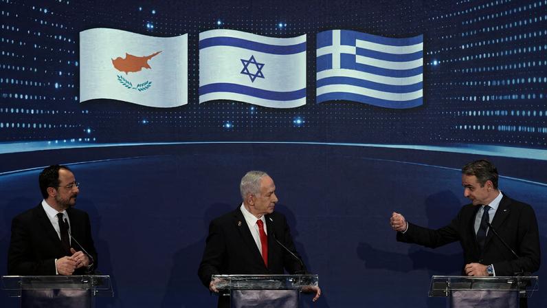 Israeli Prime Minister Benjamin Netanyahu (centre), Cyprus President Nikos Christodoulides (left) and Greek Prime Minister Kyriakos Mitsotakis hold a joint press conference after a trilateral meeting at the Citadel of David Hotel in Jerusalem, 22 December 2025. ABIR SULTAN/Pool via REUTERS/File Photo