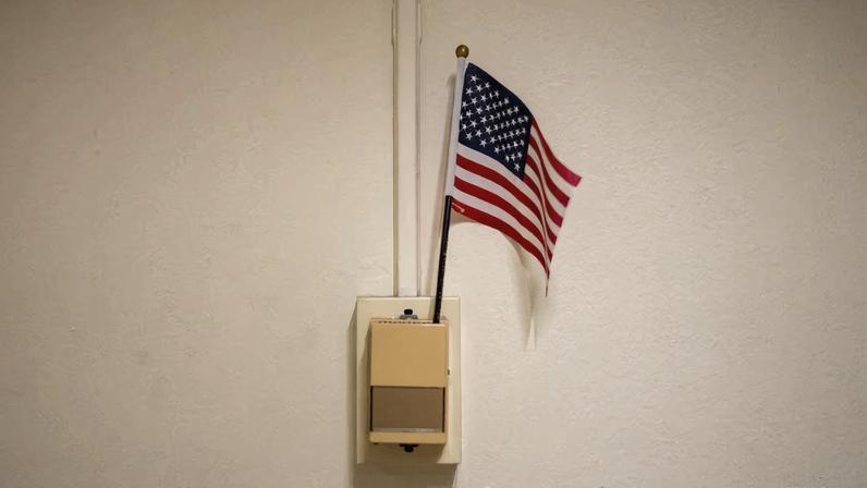 An American flag sits in a thermostat at U.S. immigration court in Manhattan, in New York City, U.S., November 28, 2025. REUTERS/David 'Dee' Delgado
