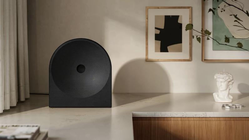 The Samsung Music Studio 5 speaker on a white marble counter.