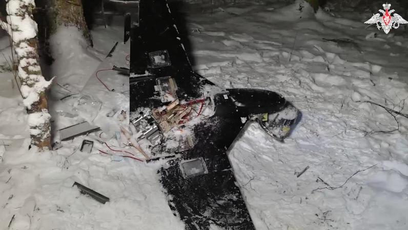 The remains of a drone, which, according to the Russian Defence Ministry, was downed during the repelling of an alleged Ukrainian attack on the Russian presidential residence in the Novgorod Region, in an unknown location in Russia, in this still image from a video released December 31, 2025. Russian Defence Ministry/Handout via REUTERS