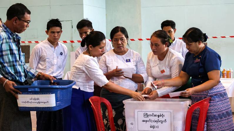 Election Commission officials count ballots at a polling station during Myanmar's general election in Yangon, Myanmar, December 28, 2025. REUTERS/Stringer