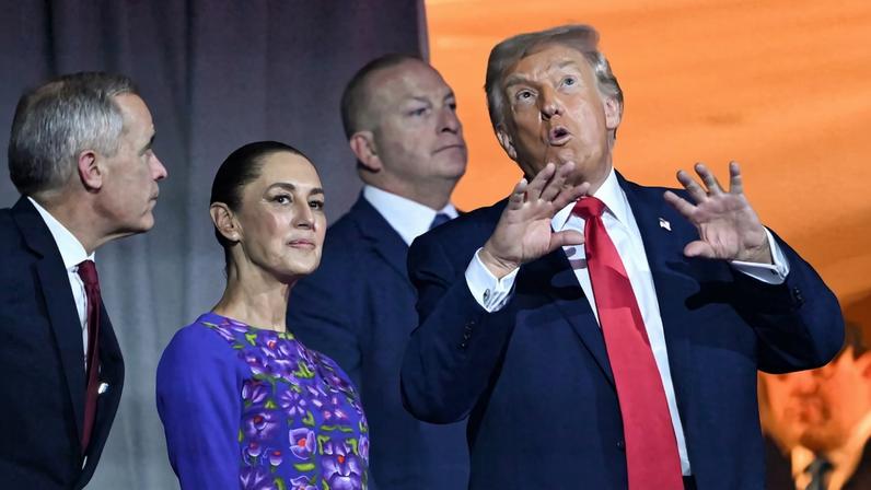 U.S. President Donald Trump gestures with both hands as he stands next to Canadian Prime Minister Mark Carney and Mexican President Claudia Sheinbaum. All wear formal attire.