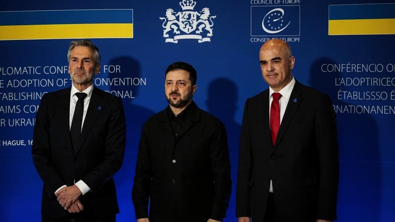 Outgoing Dutch Prime Minister Dick Schoof, Ukrainian President Volodymyr Zelensky, and Council of Europe chief Alain Berset pose ahead of a meeting of the Council of Europe in The Hague.
