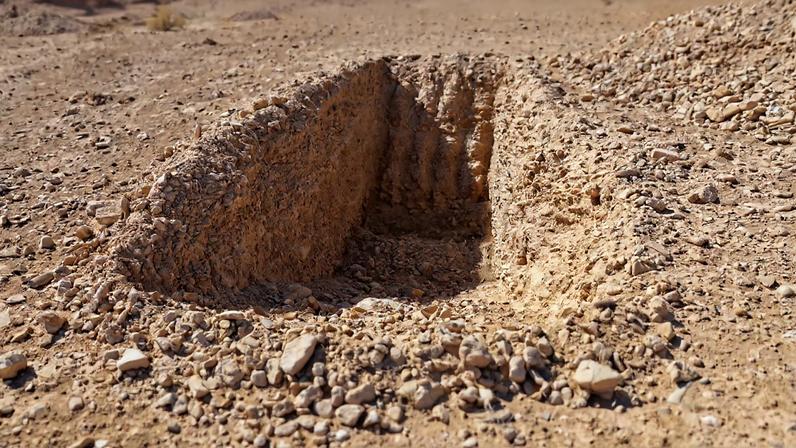 A detail of what one witness told Reuters was an incomplete trench dug to take bodies in this mass grave site in the desert near the eastern Syrian town of Dhumair