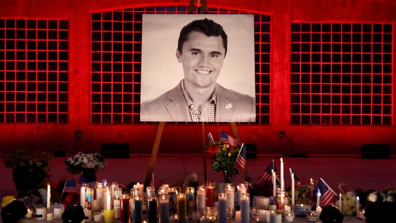 Candles and flowers are placed near an image of Charlie Kirk, during a vigil at Orem City Center Park, after U.S. right-wing activist and commentator, Charlie Kirk, an ally of U.S. President Donald Trump, was fatally shot during an event at Utah Valley University, in Orem, Utah, U.S. September 11, 2025. REUTERS/Jim Urquhart/File Photo