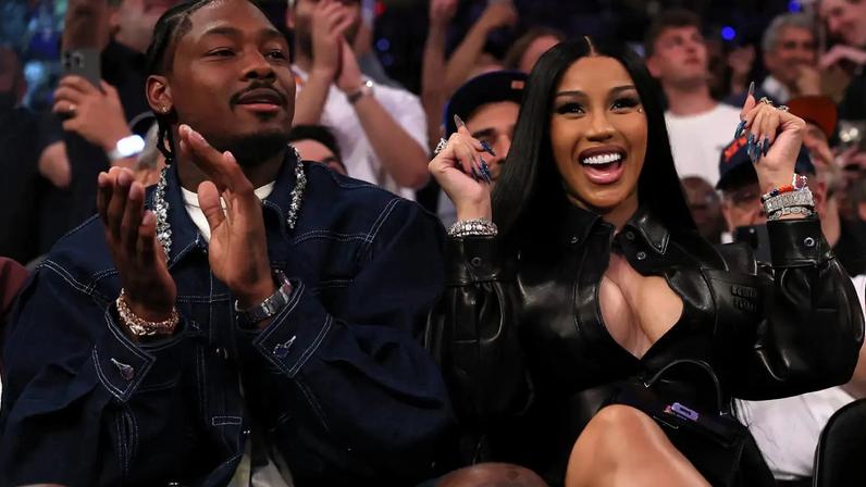 Stefon Diggs and Cardi B sit court-side at Madison Square Garden on May 12, 2025 in NYC.