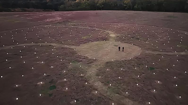 The lanterns were placed exactly where each of the 365 trees will be planted