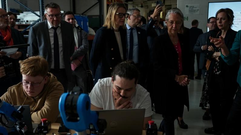 French Minister of National Education Elisabeth Borne, Minister of Labor and Employment Astrid Panosyan-Bouvet, and High Commissioner for Vocational Education and Training Eric Garnier visit the Campus of Trades and Qualifications of Excellence in Evry-Courcouronnes, France, on May 19.