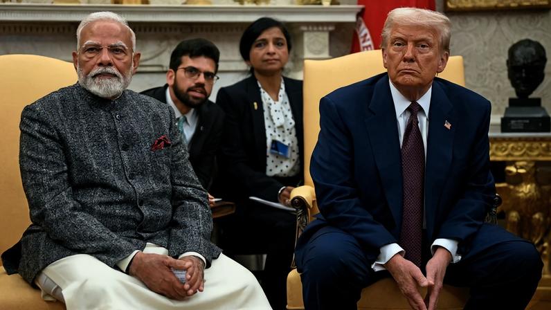 U.S. President Donald Trump speaks with the press as he meets with Indian Prime Minister Narendra Modi in the Oval Office of the White House in Washington on Feb. 13.