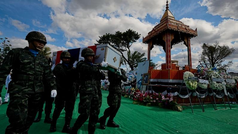 Soldiers carry the coffin of Sgt. Maj. 1st Class Ananda Udon during a royal funeral ceremony in Sisaket, Thailand, on Dec. 14.