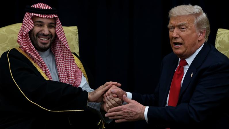 Saudi Crown Prince Mohammed bin Salman and U.S. President Donald Trump clasp hands in the Oval Office of the White House in Washington on Nov. 18.