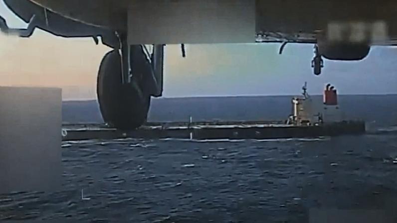 An image from a video posted on U.S. Attorney General Pam Bondi’s X account, and partially redacted by the source, shows an oil tanker being seized by U.S. forces off the coast of Venezuela on Dec. 10.