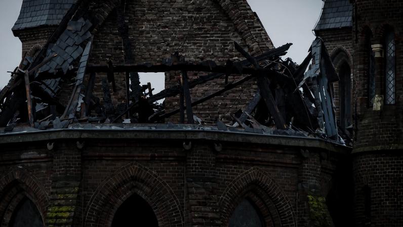 A photograph taken on January 1, 2026 shows the damage on the tower of the Vondelkerk church in Amsterdam, following a fire. (Photo by Koen van Weel / ANP / AFP) / Netherlands OUT