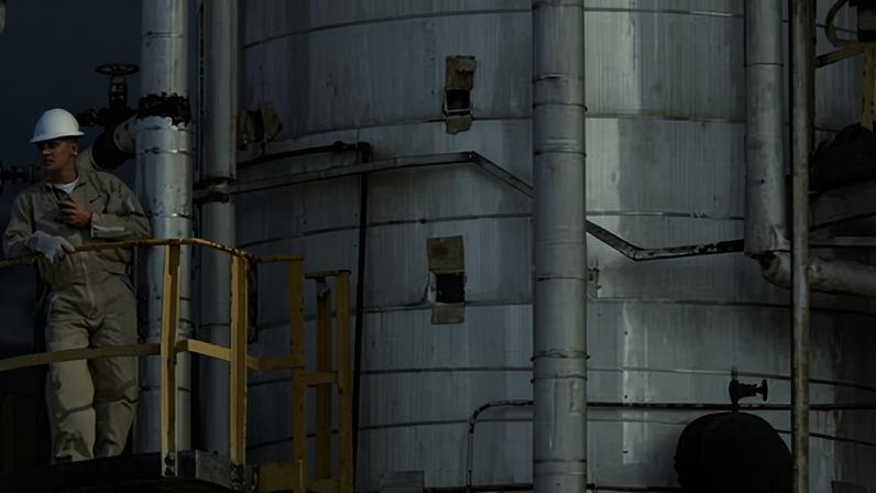 A Venezuelan oil worker at state company PDVSA’s shipment and storage terminal at Jose, 200 miles east of the capital, Caracas.