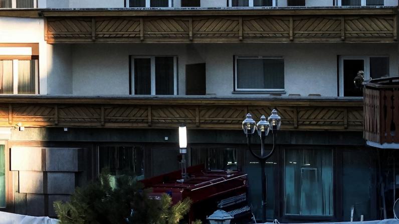 Police officers inspect the area around Le Constellation bar and lounge in Crans-Montana, Switzerland.