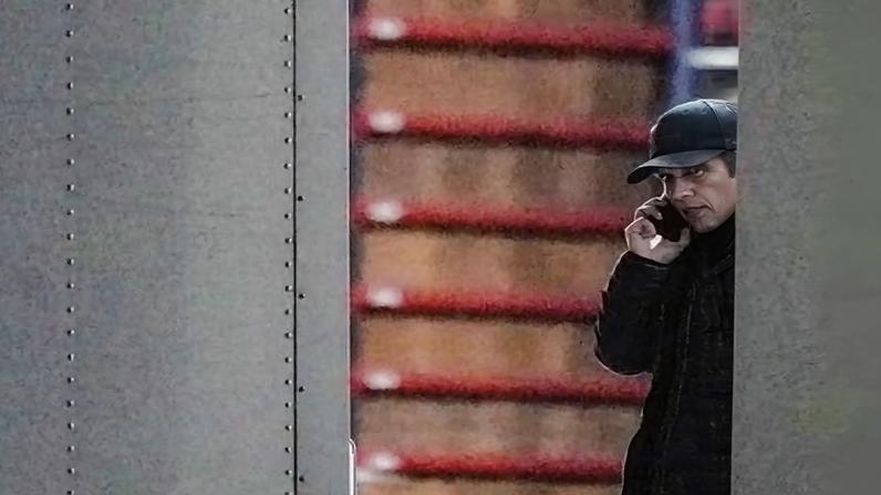 Tulsi Gabbard standing inside a vehicle loaded with boxes outside the Fulton county election hub and operation center after the FBI executed a search warrant there, in Union City, Georgia, on 28 January.