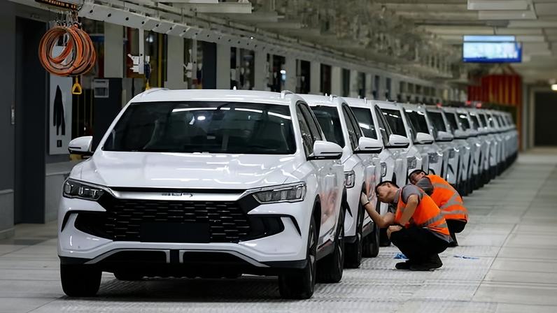 Workers clean vehicles at BYD’s factory in Camacari, Brazil. The company recorded 4.55m car sales worldwide during 2025.