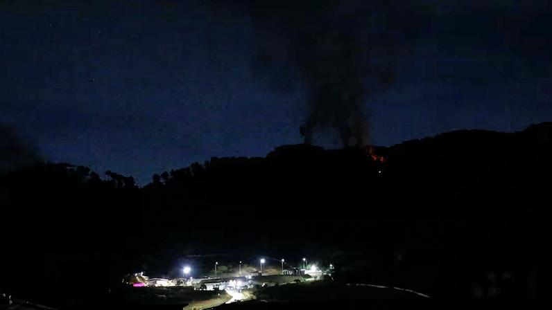 Smoke rises near Fort Tiuna, a military zone, during a full blackout, following explosions and loud noises, amid rising tensions between administrations of U.S. President Donald Trump and Venezuelan President Nicolas Maduro, in Caracas, Venezuela, January 3, 2026. REUTERS/Leonardo Fernandez Viloria