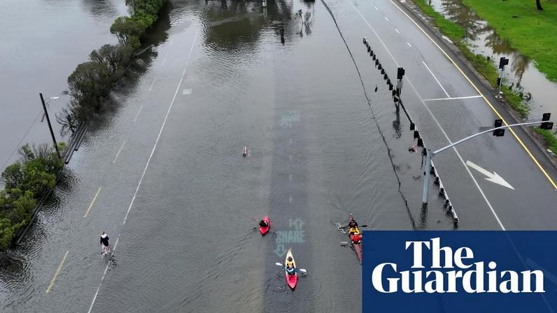 Floodwaters covered roads in Marin county on Saturday as residents kayaking on the bike trail during high tide between Sausalito and Mill Valley, California.