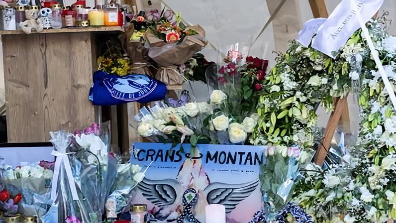 Flowers and candles outside Le Constellation bar in Crans-Montana, Switzerland, this week in memory of the 40 young people who died.