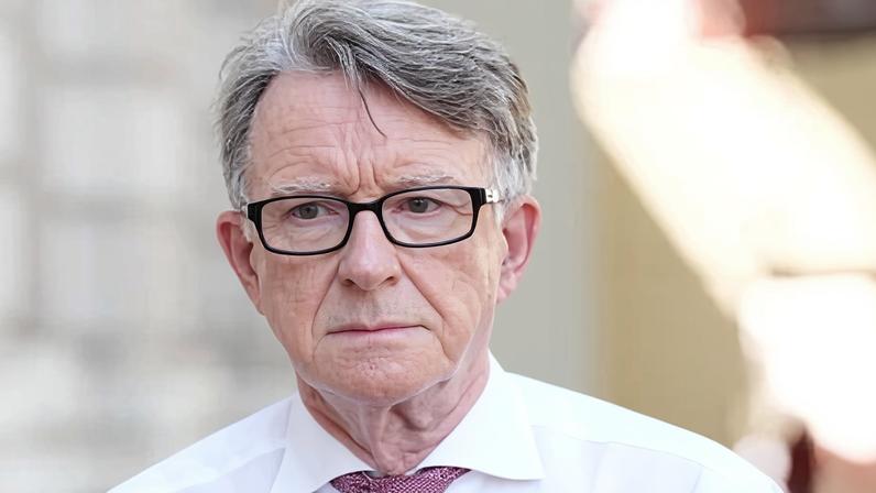 Peter Mandelson arriving at the Cabinet Office in central London, looking a bit sad