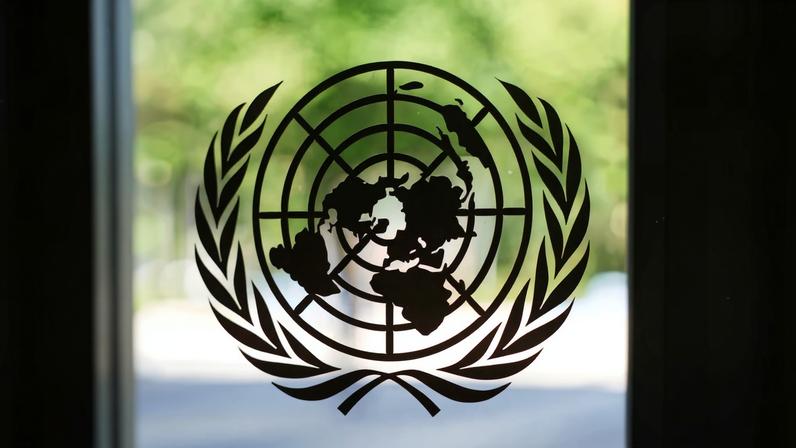 The United Nations logo adorns a window at U.N. headquarters in New York City
