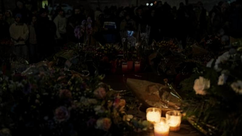 Mourners lay flowers and light candles in tribute to victims of the fire at Le Constellation bar during New Year's Eve celebrations in Crans-Montana, Switzerland