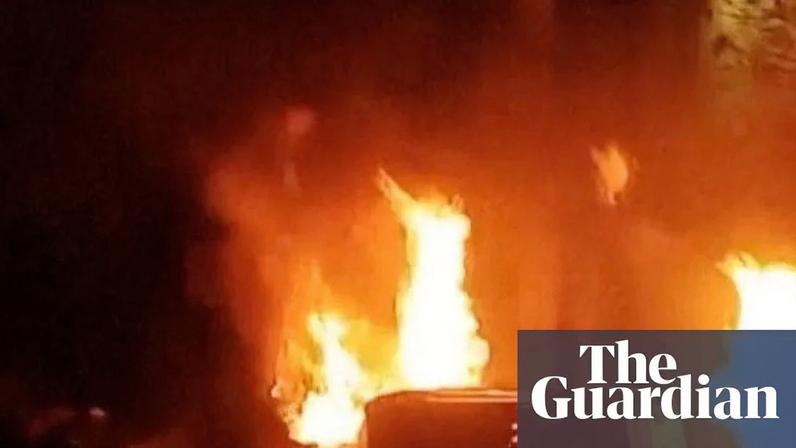 A still from an eyewitness video shows fires burning outside a police station in Iran's Lorestan province on 1 January. Protests have spread from Tehran to about 32 cities across Iran.