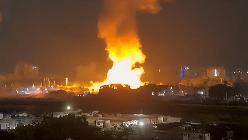 Smoke rises from explosions in Caracas, Venezuela, January 3. via REUTERS
